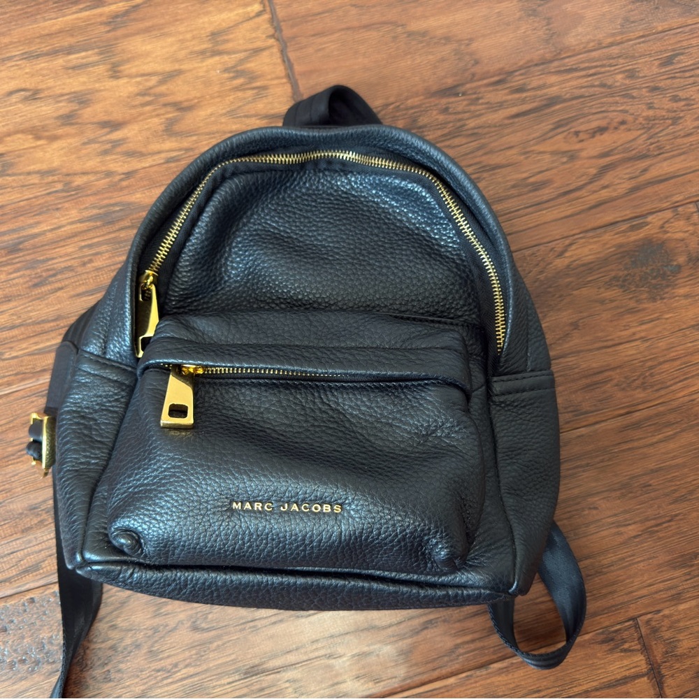 Marc Jacobs black mini backpack.